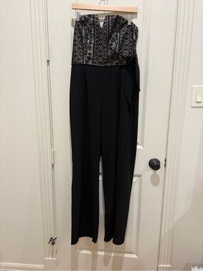 Francesca’s Black Strapless Jumpsuit with Metallic Patterned Bodice
